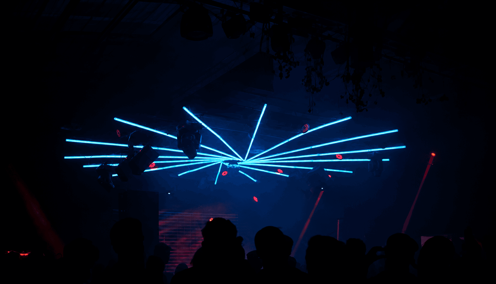 Blue radial light installation at Love/Tropicals.